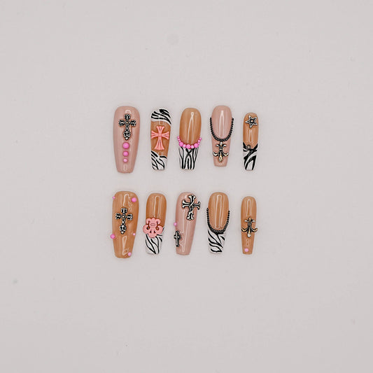 Zebra Punk Press-On Nails – Nude & Black Y2K Style with Cross Charms & Pink Accents