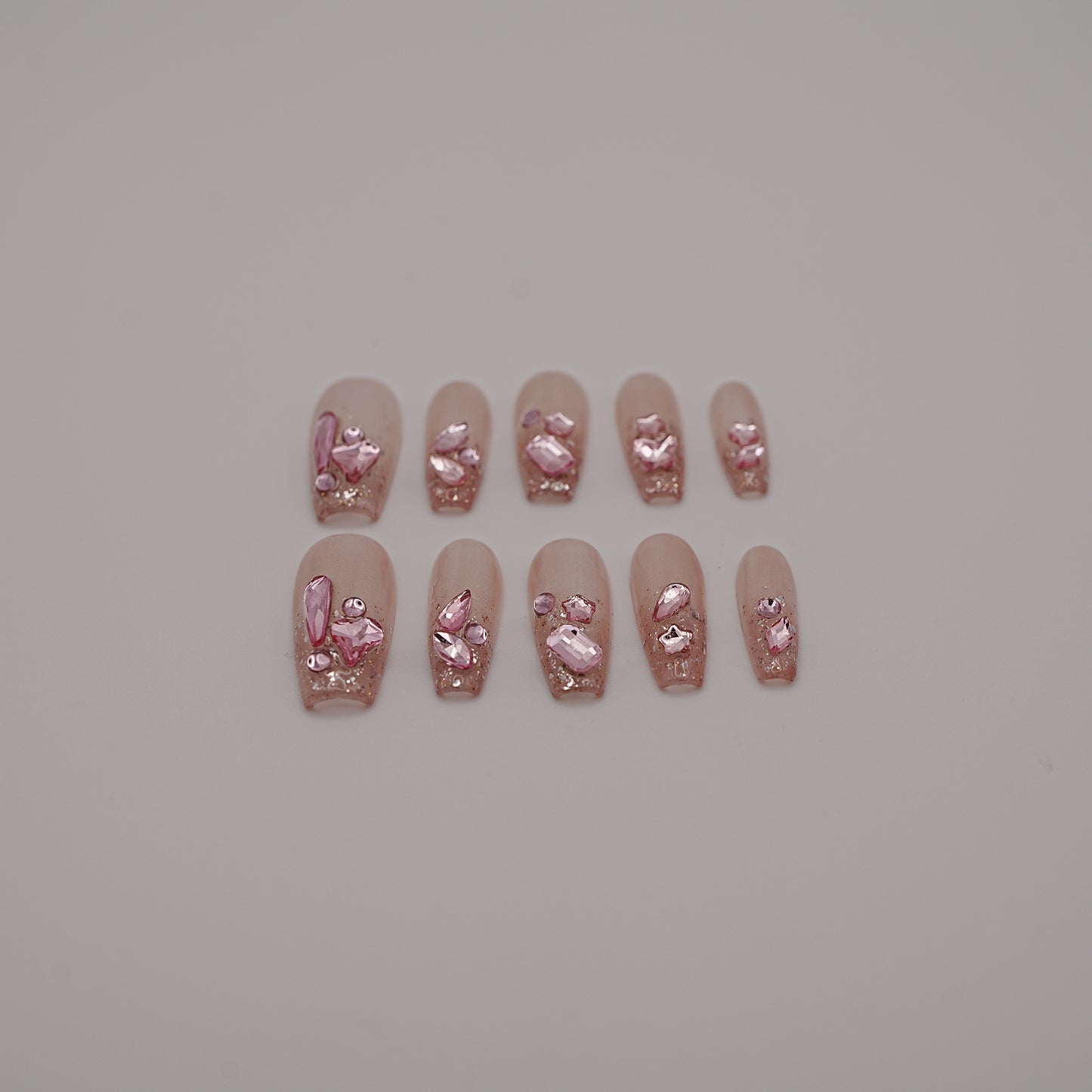 Rosé Crystal Press-On Nails – Nude Jelly Base with Pink Gem Clusters