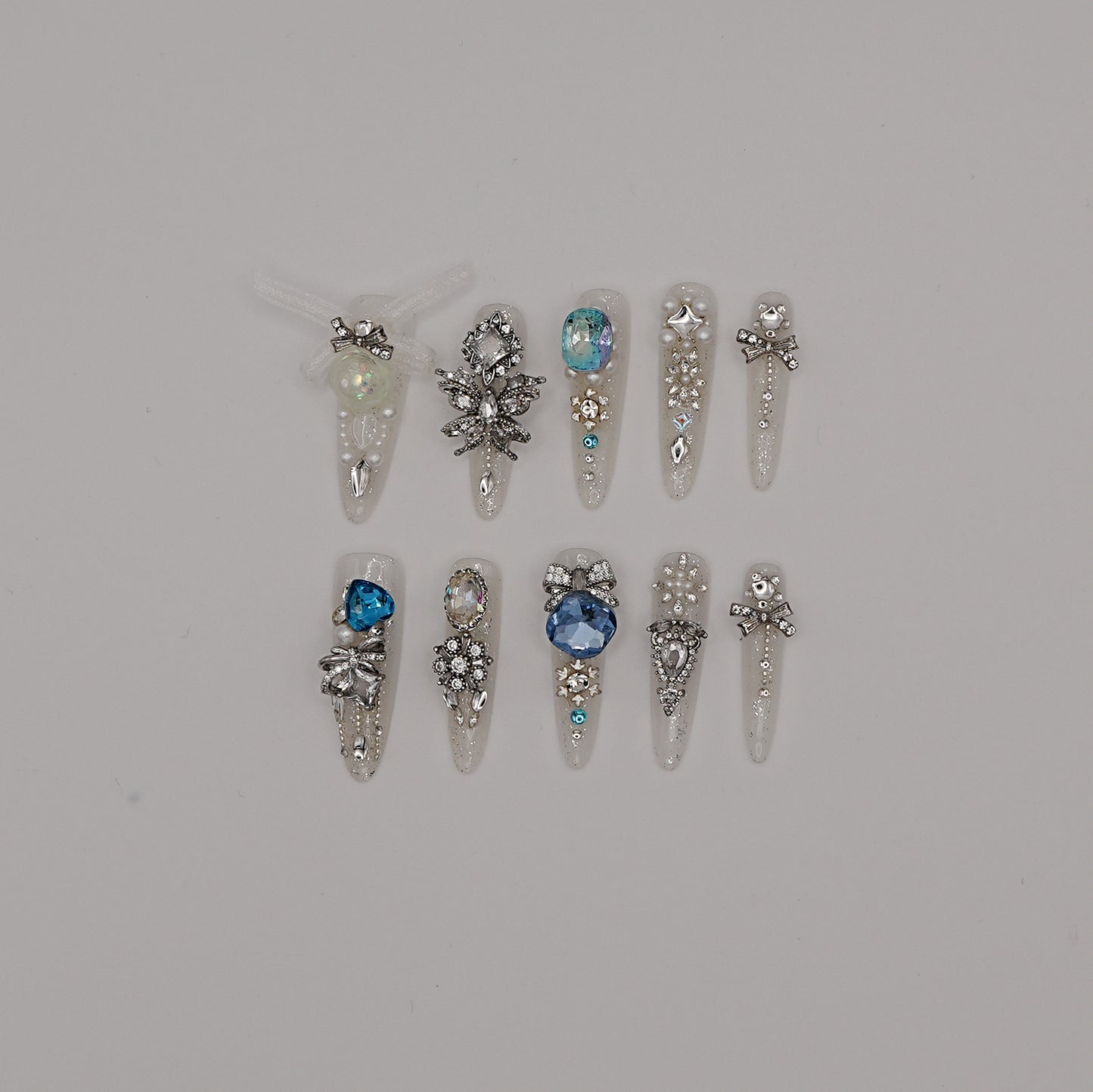 Frozen Queen Press-On Nails – White Glitter with Blue Crystals & Winter Charms