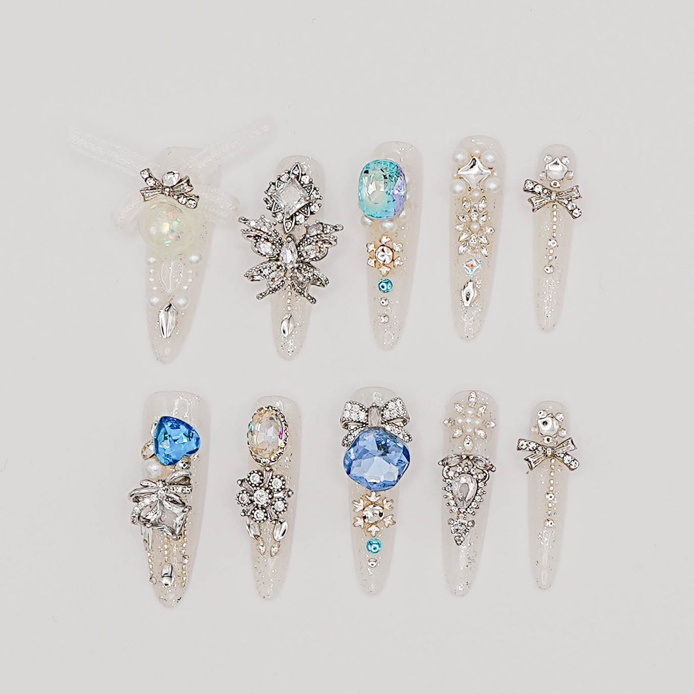 Frozen Queen Press-On Nails – White Glitter with Blue Crystals & Winter Charms