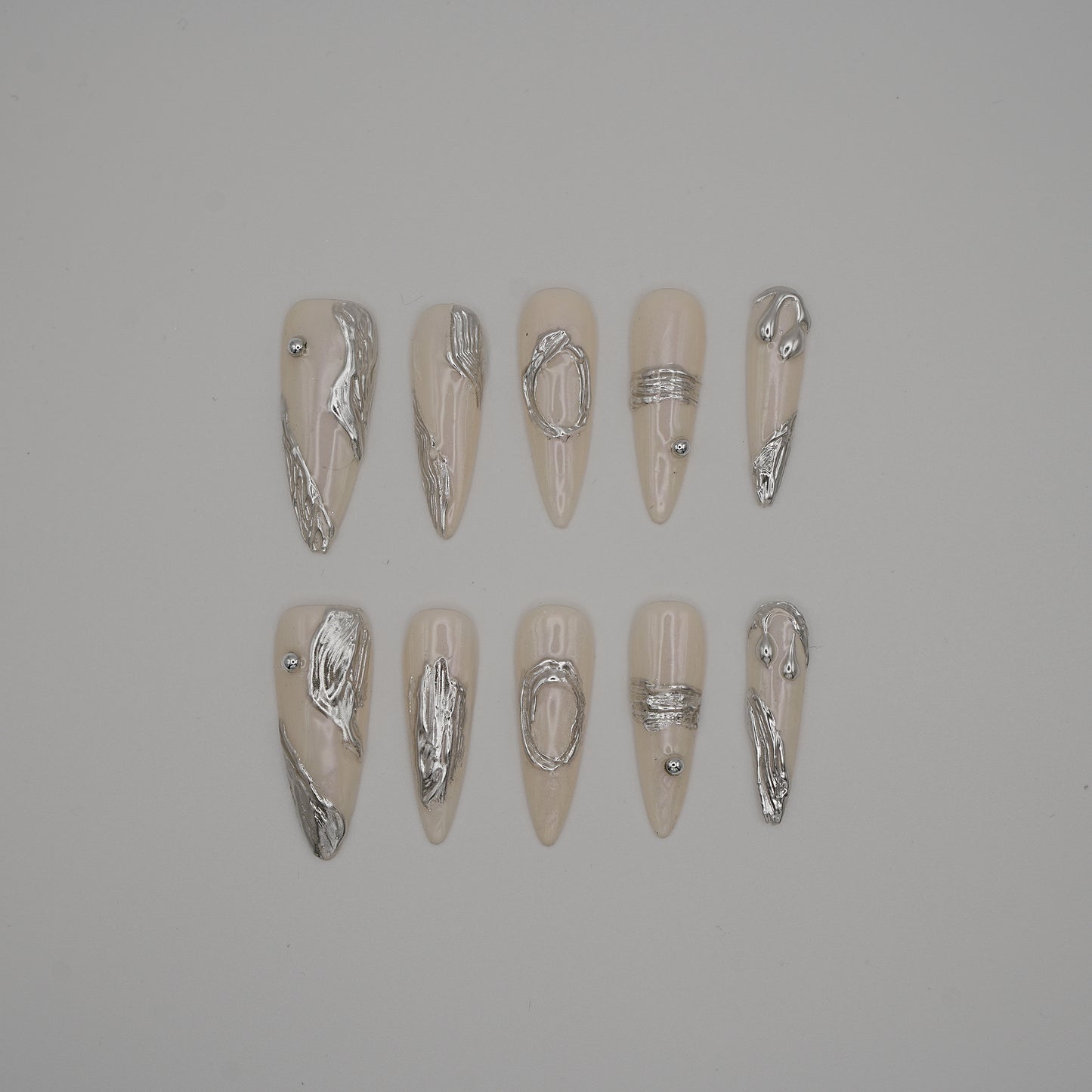 Molten Metal Press-On Nails – Nude Chrome Abstract Sculptural Design