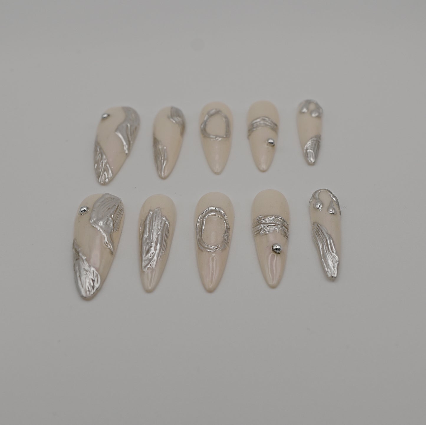 Molten Metal Press-On Nails – Nude Chrome Abstract Sculptural Design