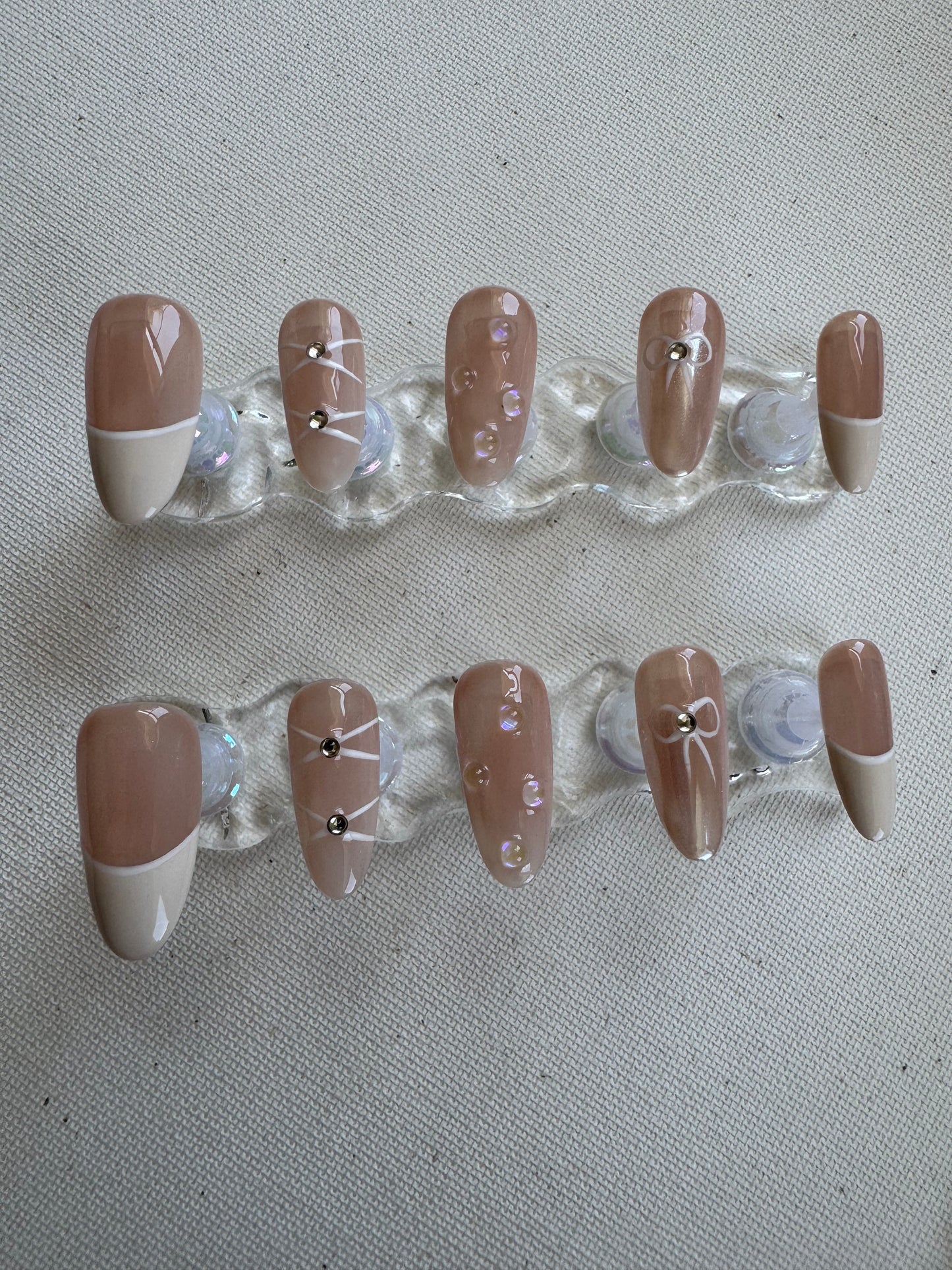 Dewdrop Kiss – Nude French with Bow and Waterdrop Accents