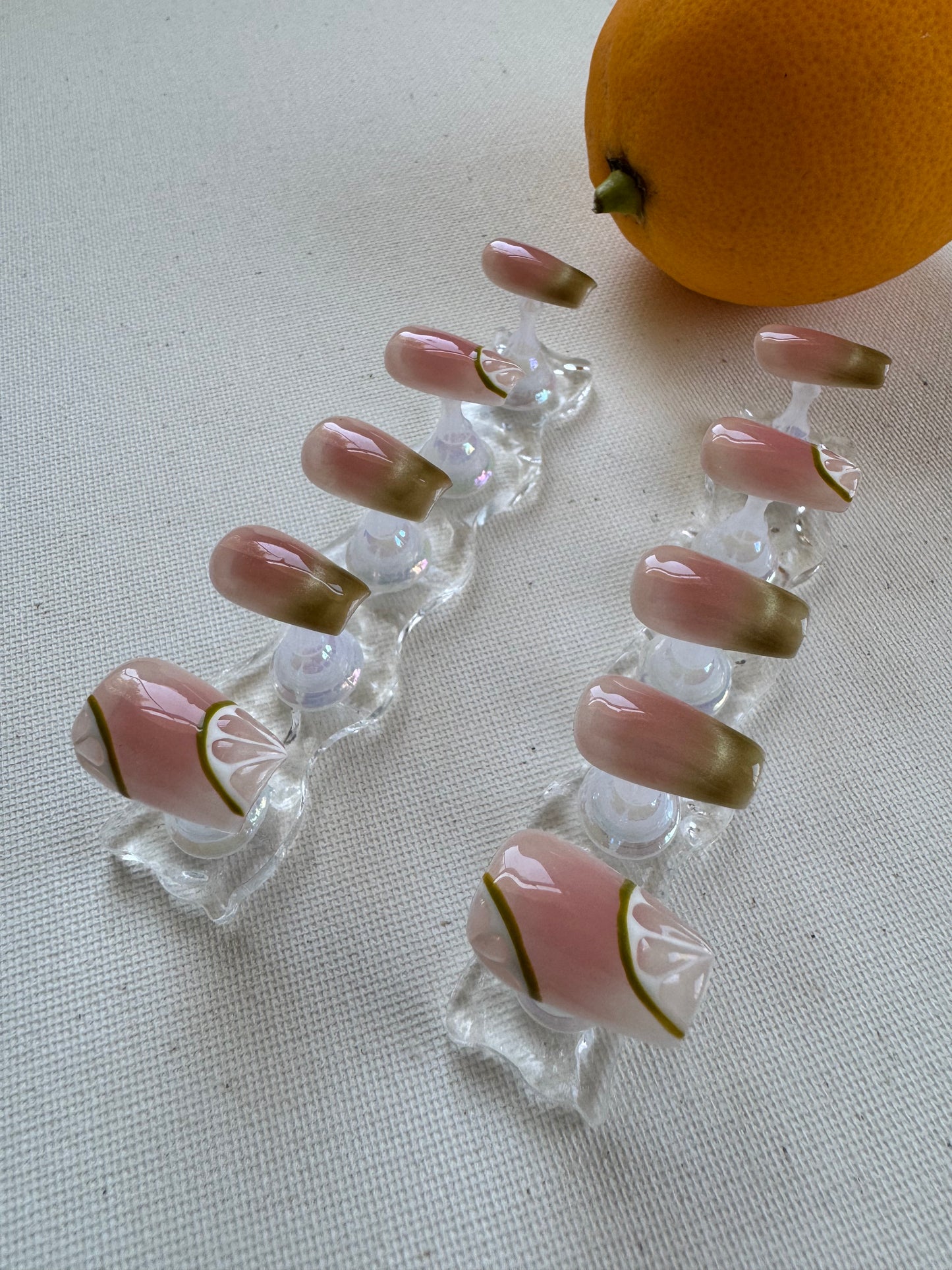 Painted summer lime nude wearing armor press on nails