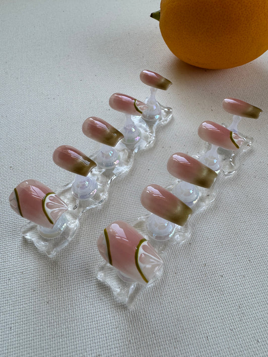 Painted summer lime nude wearing armor press on nails