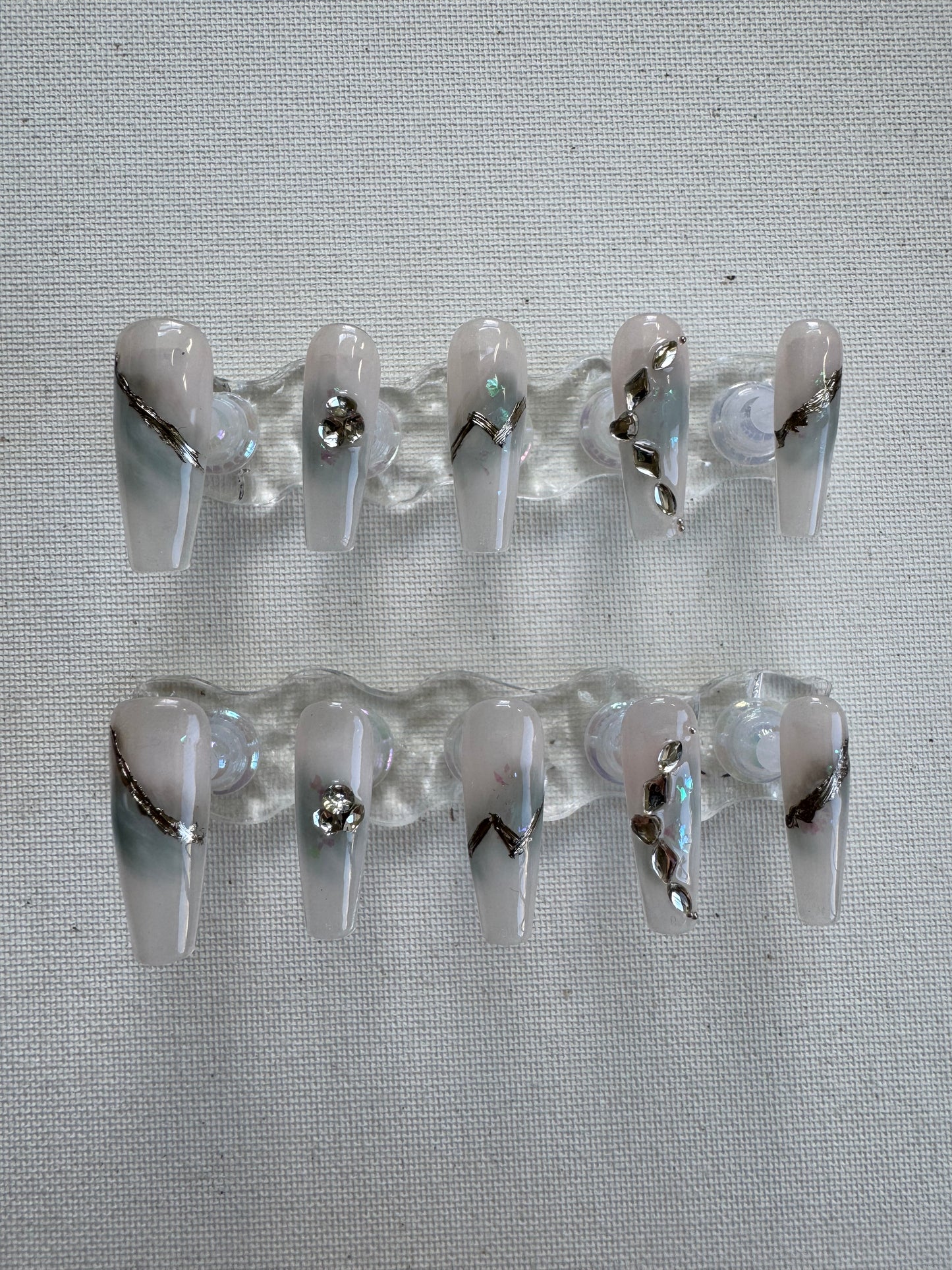 Gemflow – Sculpted Opalescent Nails with Crystal Lines & Rhinestones